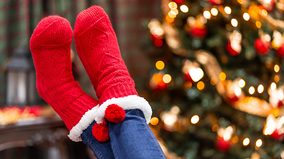 Winter socks in front of a christmas tree