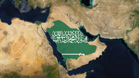 Saudi Arabia national flag waving in the wind on a clear day. Green field with Shahada and sword in Thuluth script. Rippled fabric. 3d illustration render
