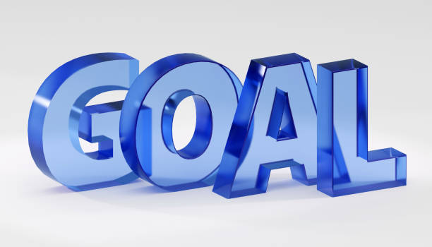istock Glass letters inscription goal on grey podium, soft light, smooth background, 3d rendering 1809755459