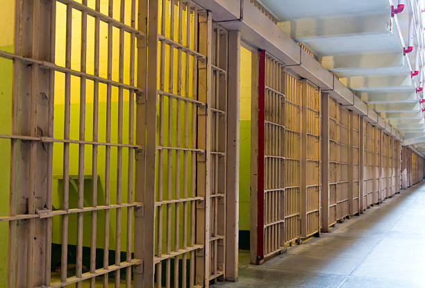 Prison cell bars stock photo