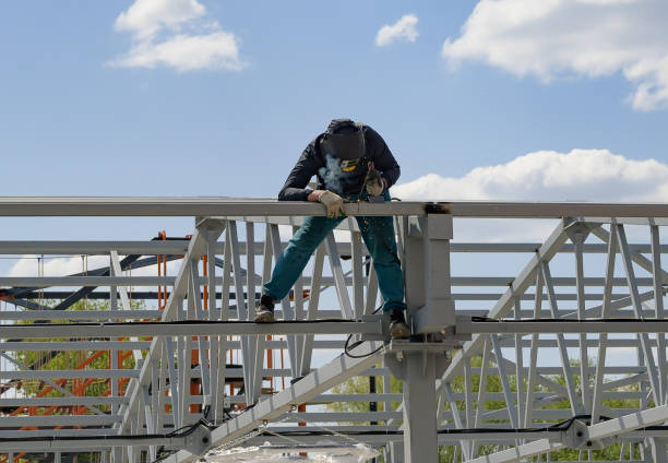 istock man welds at the factory 1809761162