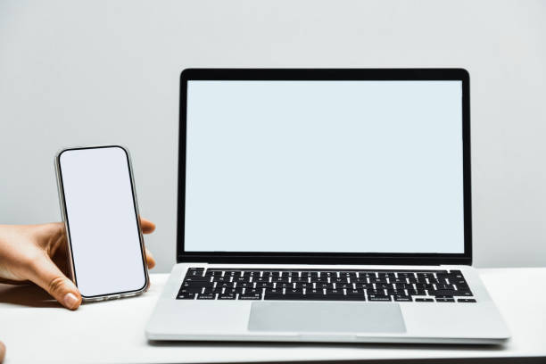 Blank Screen Ready To Be Filled With Data On Smartphone And Laptop