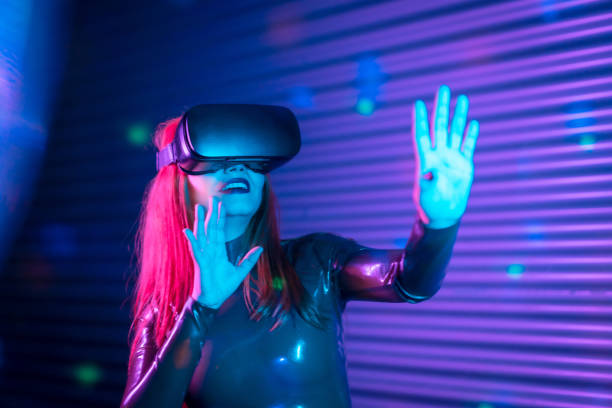 istock Happy woman during an interactive game with VR goggles 1809766919