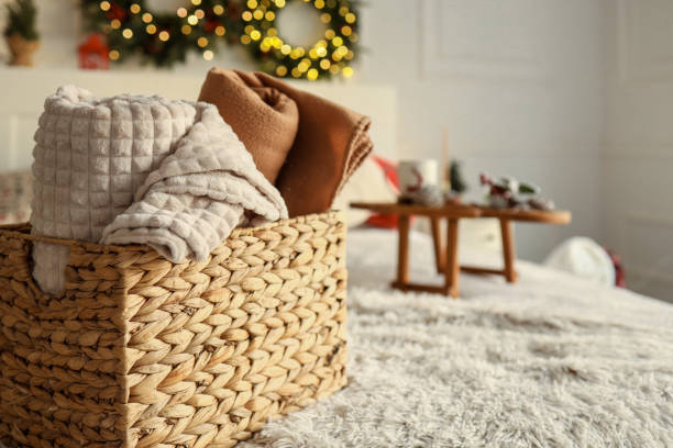 istock Wicker basket with cozy blankets, home mood 1809767478