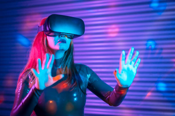 istock Blonde woman during an interactive game with VR goggles 1809770255