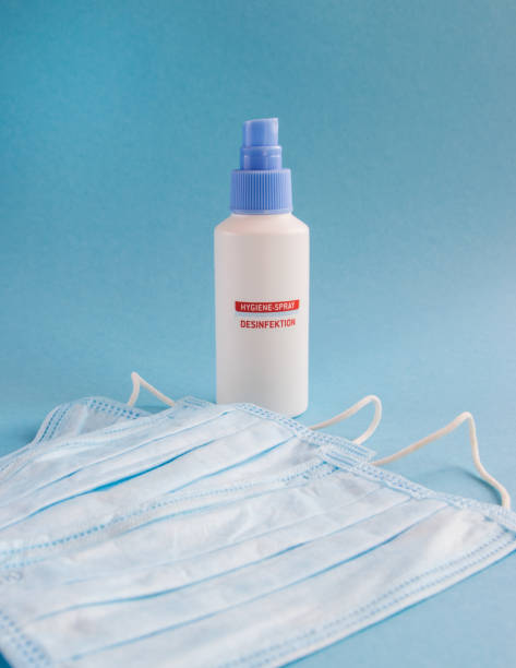 istock Antibacterial mask and gel on the blue background. 1809770798