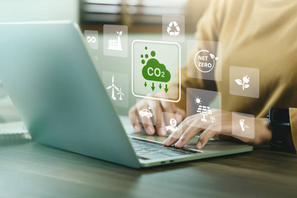 istock Company use computer report results to reduce CO2 emissions carbon footprint climate change and Net zero to limit global warming. Sustainable development and innovation green business concept. 1809779081