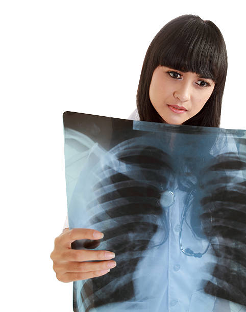 istock Nurse Looking At A Patients Chest X-Ray 180978568