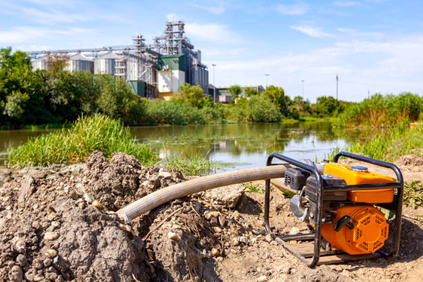 istock Water engine pump fills the cistern at construction site 1809790556