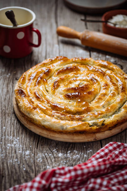istock Traditional Bosnian and Turkish meal made from rolled pastry filled with cheese. In Turkey it is called Borek. In Bosnia this dish is called Pita Sirnica. Made from filo or phyllo dough. 1809830077
