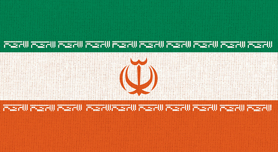 flag of Iran. National Iranian flag on fabric surface. Iranian national flag on textured background. Fabric Texture. Islamic Republic of Iran. Asian country. State symbol of Iran