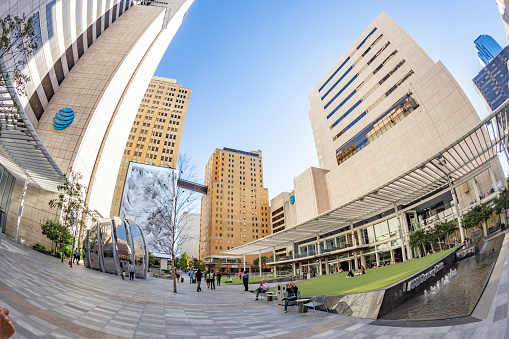 Dallas, USA - November 6, 2023: fisheye view of historic skyscraper in old town od Dallas under blue sky.