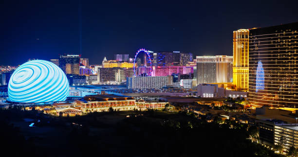 Hotels and Entertainment Venues in Las Vegas at Night - Aerial Aerial shot of Las Vegas, Nevada at night. Authorization was obtained from the FAA for this operation in restricted airspace. the strip stock pictures, royalty-free photos & images