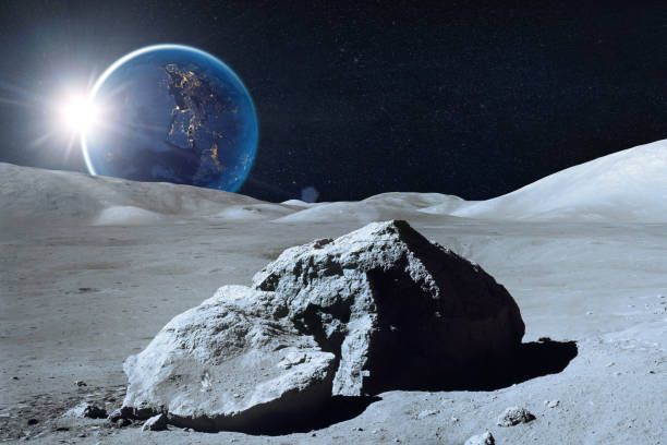 istock Moon surface in deep space. Moon and Earth at night. Elements of this image furnished by NASA. 1809915749