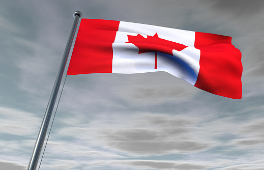 Canadian Flag on a Cloudy Sky