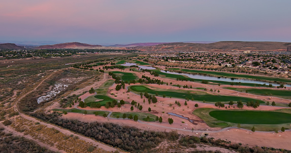 Aerial shot of a golf course on the edge of St. George, a city in Washington County in southwestern Utah.