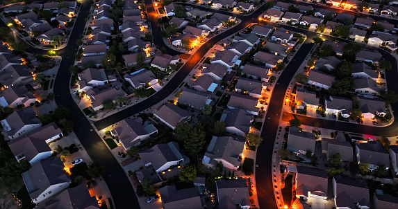 High angle aerial shot of residential streets of single family homes in St. George, a city in Washington County in southwestern Utah.