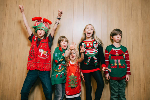 istock Group of Children With Ugly Christmas Sweaters 1809937329