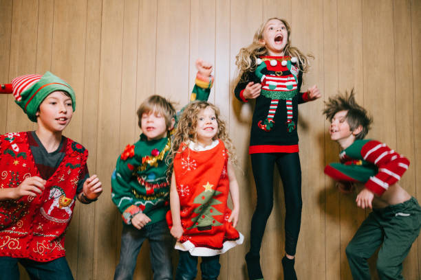istock Group of Children With Ugly Christmas Sweaters 1809937477