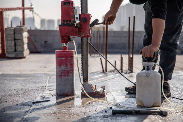istock Pumping up pressure into a water tank for drilling a reinforced concrete floor using a drilling rig 1809988928
