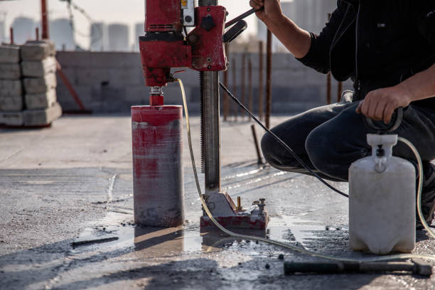 istock Drilling reinforced concrete floors with an automatic electric drilling rig 1809989047