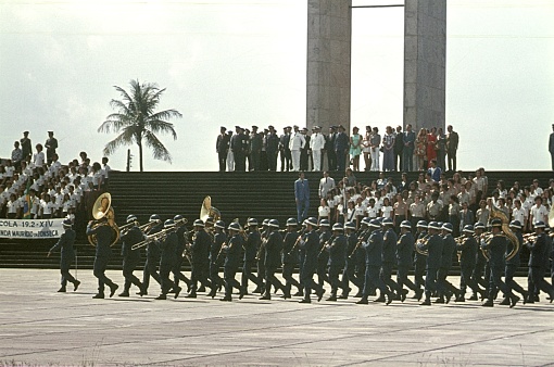 Rio de Janeiro, Brazil, 1974. Military band at a ceremony in Rio de Janeiro. Furthermore: participants, guests and spectators.