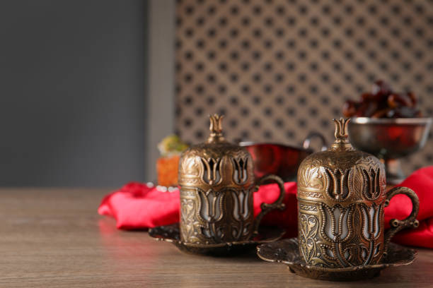 istock Beautiful vintage cup holders on wooden table, space for text 1810007966
