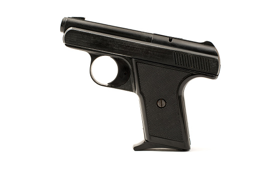 pistol isolate on a white background. Armament for the army and police. Short-barreled weapon.