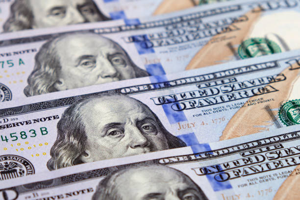 istock Close-up lots of $100 bills. 1810025382