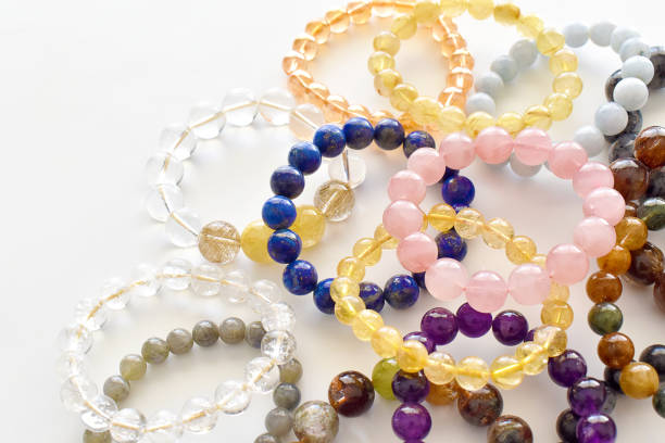 istock Collection of crystal gemstones bracelets. 1810051760