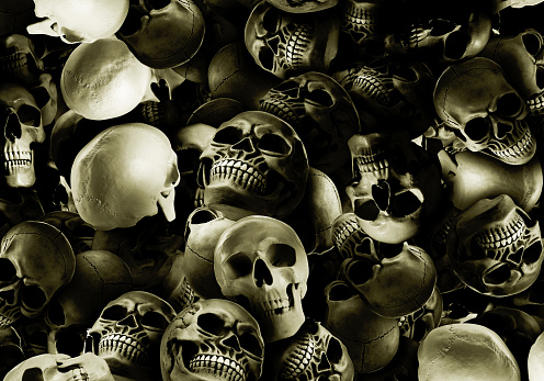 Many scary human skulls as background. Collage design