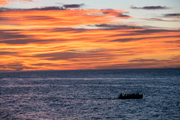istock Cloudy dawn next to the Aguilas lighthouse on the Spanish coast. 1810071319