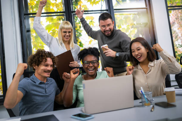 istock Happy businesspeople collaborating on a new project in an office 1810080101
