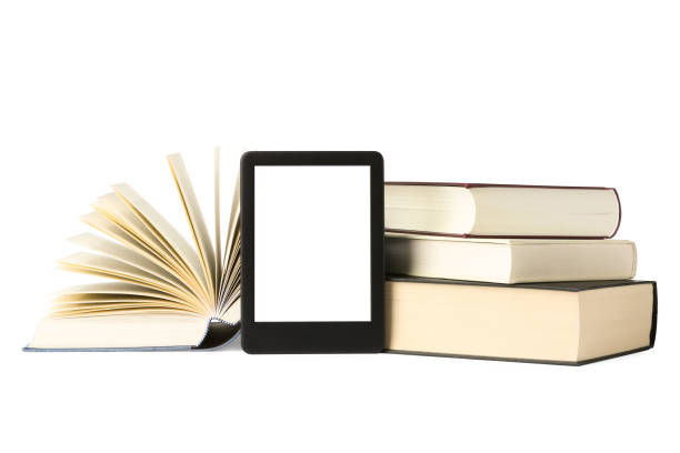 istock Modern e-book and stack of hardcover books isolated on white 1810100127