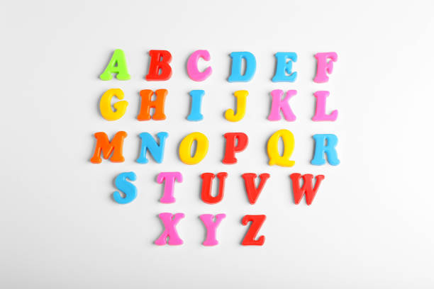 istock Colorful magnetic letters on white background, flat lay. Alphabetical order 1810100144
