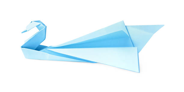 istock Light blue paper swan isolated on white. Origami art 1810101206