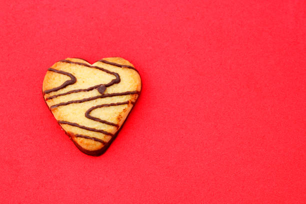 Cookie with chocolate lines and heart shape