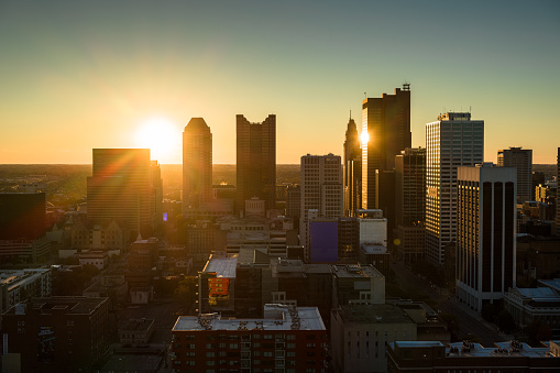 Aerial still image of Downtown Columbus taken by a drone with the sun setting on a clear, Fall day in Ohio.