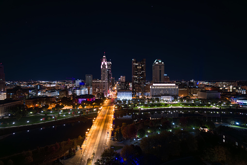 Aerial still image of Downtown Columbus, with Discovery Bridge and Columbus City Hall, taken by a drone on a clear night in Ohio.