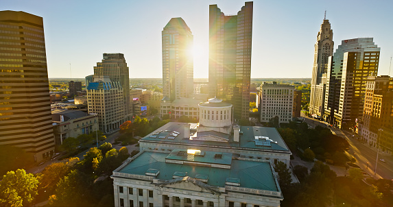 Aerial still image of the Ohio Statehouse taken by a drone on a clear, Fall day in Columbus, Ohio.