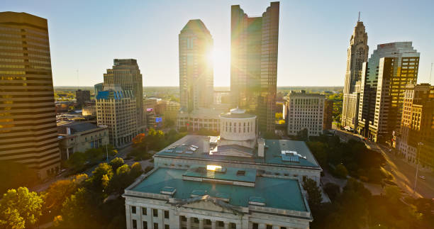 Aerial View of Ohio Statehouse on Clear, Fall Day Aerial still image of the Ohio Statehouse taken by a drone on a clear, Fall day in Columbus, Ohio. ohio ohio statehouse columbus state capitol building stock pictures, royalty-free photos & images