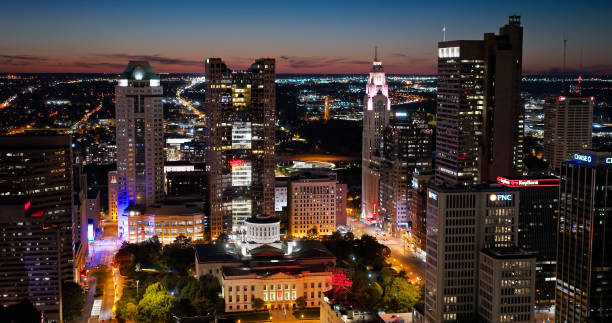 Aerial View of Ohio Statehouse at Twilight Aerial still image of the Ohio Statehouse in Downtown Columbus taken by a drone on a clear, Fall night. ohio ohio statehouse columbus state capitol building stock pictures, royalty-free photos & images