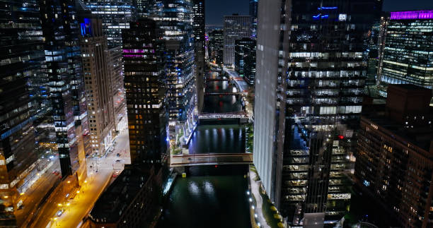 istock Chicago River and Downtown Skyscrapers at Night - Aerial View 1810165723
