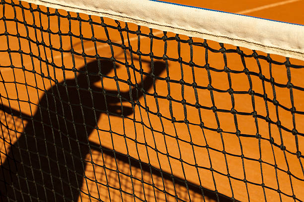 istock Shadow on the tennis court 181022959