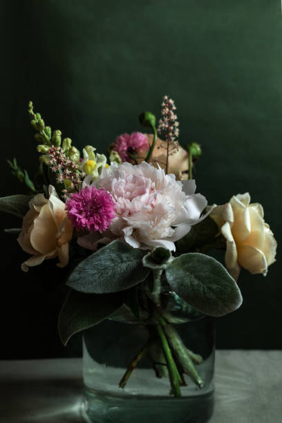 istock Bouquet Of Different Flowers On Dark Green Background 1810246676