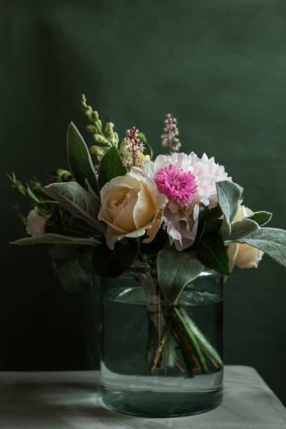 istock Bouquet Of Different Flowers On Dark Green Background 1810246682