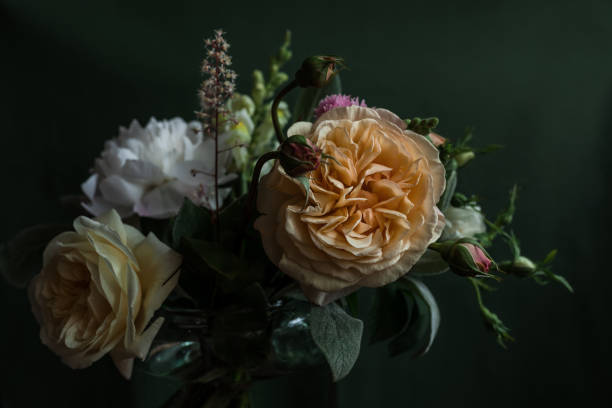 istock Bouquet Of Different Flowers On Dark Green Background 1810247214
