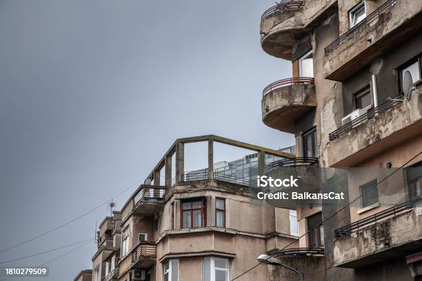 Selective Blur On Residential Buildings Flats And Apartments In A Small Street Of Bucharest City Center With A Typical Southeastern European Chaotic Urbanism Decaying In Bad Condition Ruined Stock Photo - Download Image Now