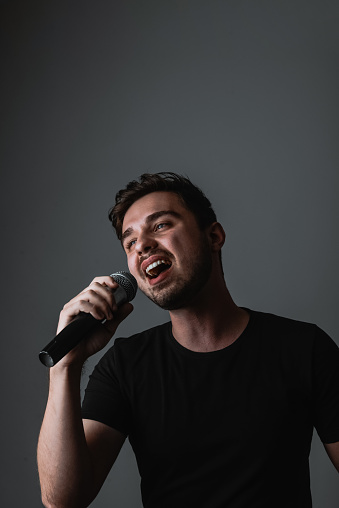 Confidence Shown During Singing A Song By Young Male Musician