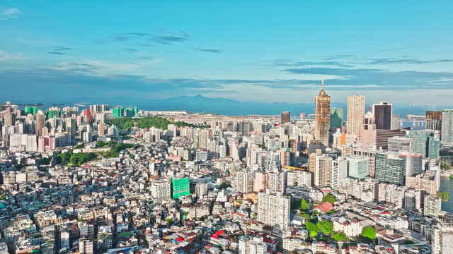 Aerial video of the city financial district skyline on Macau island
